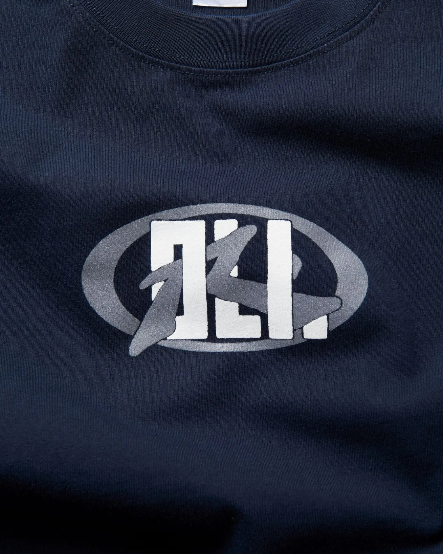 Oli X Badge Tee | Rusty Fashion