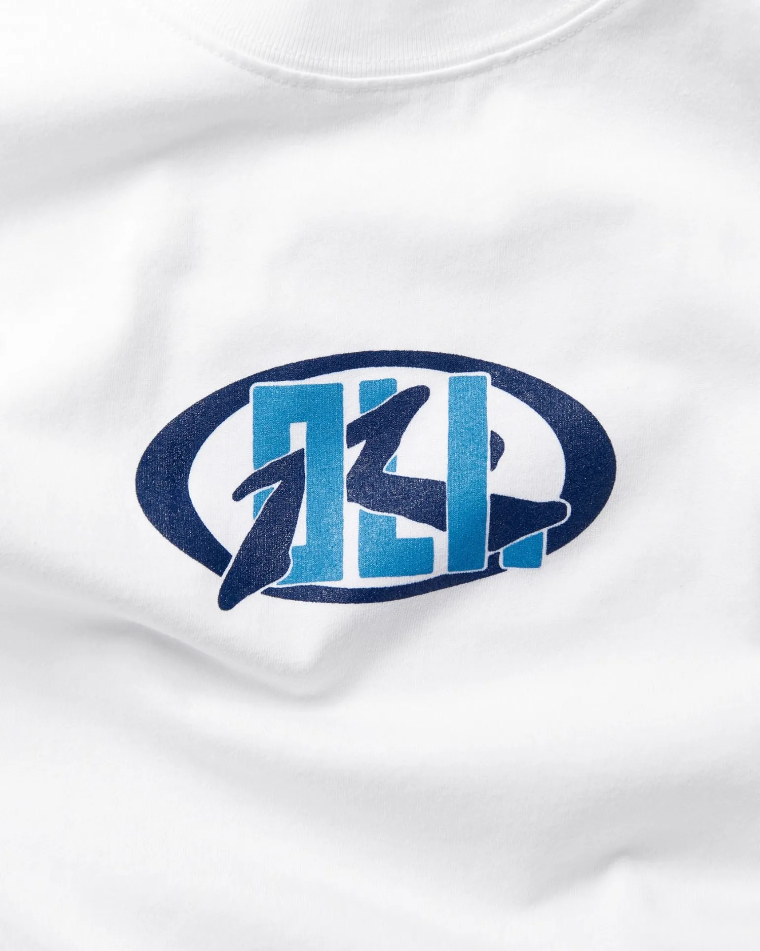 Oli X Badge Tee | Rusty Online