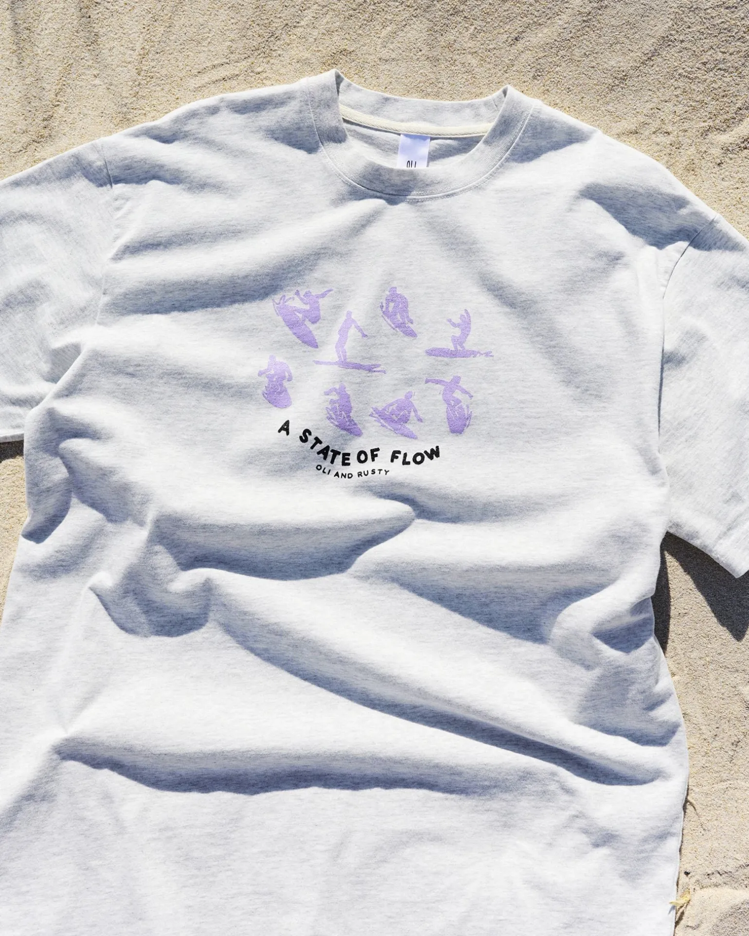 Oli X State Of Flow Tee | Rusty Store