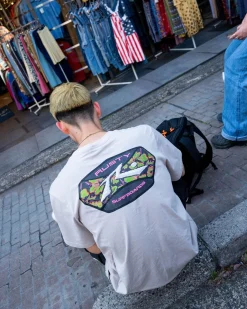 Smash Advocate Short Sleeve Graphic Tee | Rusty New